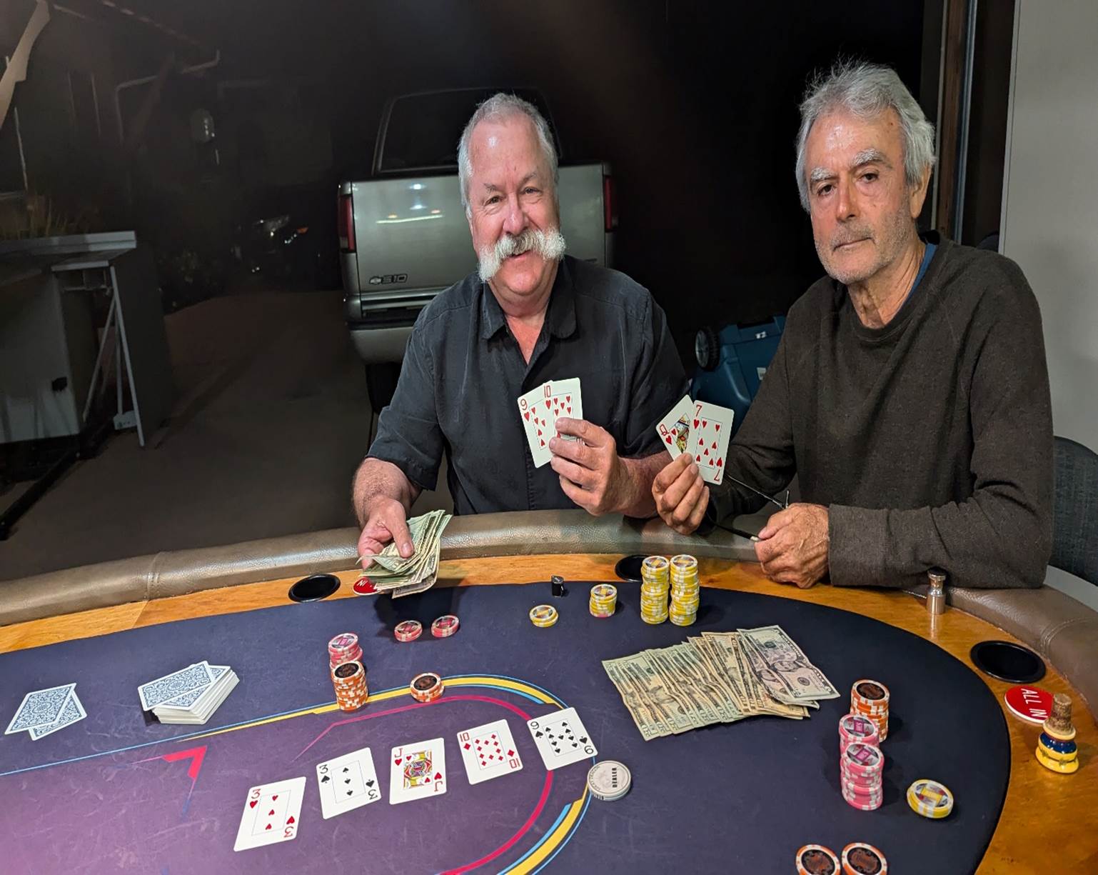 A group of men playing poker

Description automatically generated